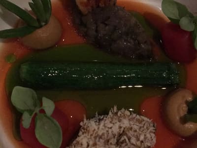 Gourmet vegetable bowl with zucchini centerpiece