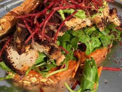 Grilled Chicken Sandwich at Outdoor Table