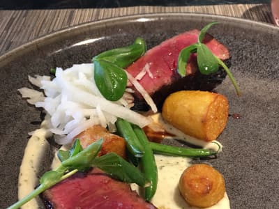 Gourmet Seared Steak on Dark Plate