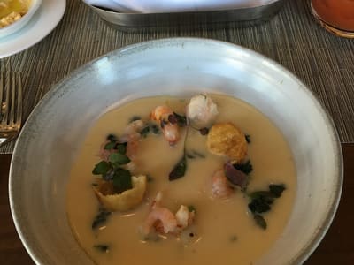 Creamy Shrimp Bisque at Restaurant Table