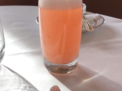 Pink Cocktail on Sunny Restaurant Table