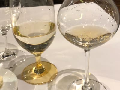 Two wine glasses on a restaurant table