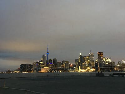 Toronto skyline at dusk from waterfront
