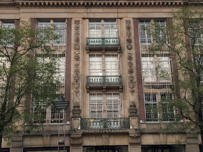 De Bijenkorf department store facade and crowd