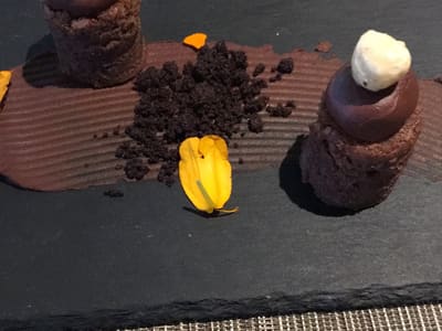 Plated chocolate dessert on slate board