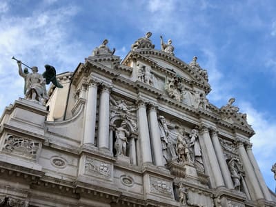 Baroque church facade under blue sky